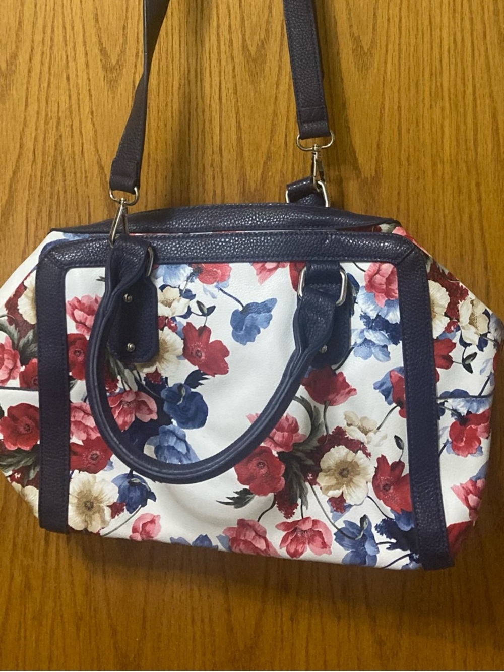 Charming Charlie Navy Floral Duffle.  Great Condition.